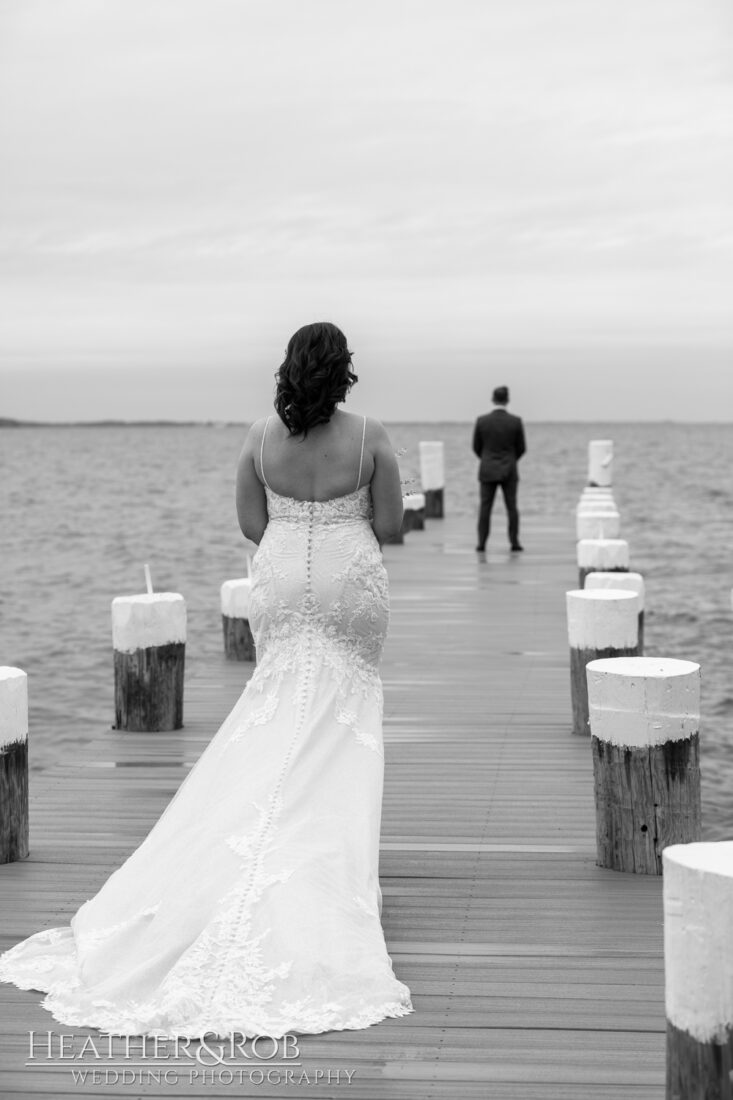 Wedding photography is a skilled profession, especially in Maryland. Photo by husband and wife team Heather & Rob Wedding Photography. Black & white photography, first look, bride, wedding dress.